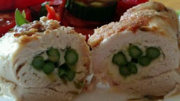 Chicken Asparagus Roll-Ups Recipe - Very flavorful chicken and asparagus dish with almost a hollandaise-inspired flavor with a little crunch from the Panko breadcrumbs. #chicken #asparagus #rollups #chickenrecipe #chickenrecipes #chickenrollups #chickenrollupsrecipe #rollupsrecipe #asparagusrecipe #recipes