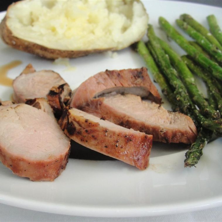 Grilled Pork Tenderloin Recipe - This pork recipe is always tender and juicy. Serve with additional barbecue sauce for dipping. #grilledporktenderloin #grilledpork #grilledporkrecipe #pork #porkrecipe #porktenderloin #porktenderloinrecipe #recipes