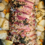 Herb, Garlic and Bacon Pork Loin Recipe Delicious pork loin roasted with bacon that the whole family will love. #bachon #baconrecipe #pork #porkrecipe #porkloin #porkloinrecipe #recipes