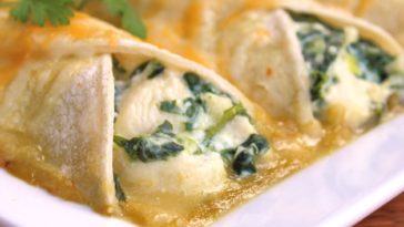 Spinach Enchiladas Recipe - If you like spinach and Mexican food, you'll love these easy vegetarian enchiladas made with ricotta cheese and spinach. #spinach #spinachenchiladas #spinachrecipe #spinachrecipes #spinachenchiladasrecipe #enchiladasrecipe #mexicanfood #mexicanrecipes #vegetarian #vegan #veganrecipes #vegetarianrecipes