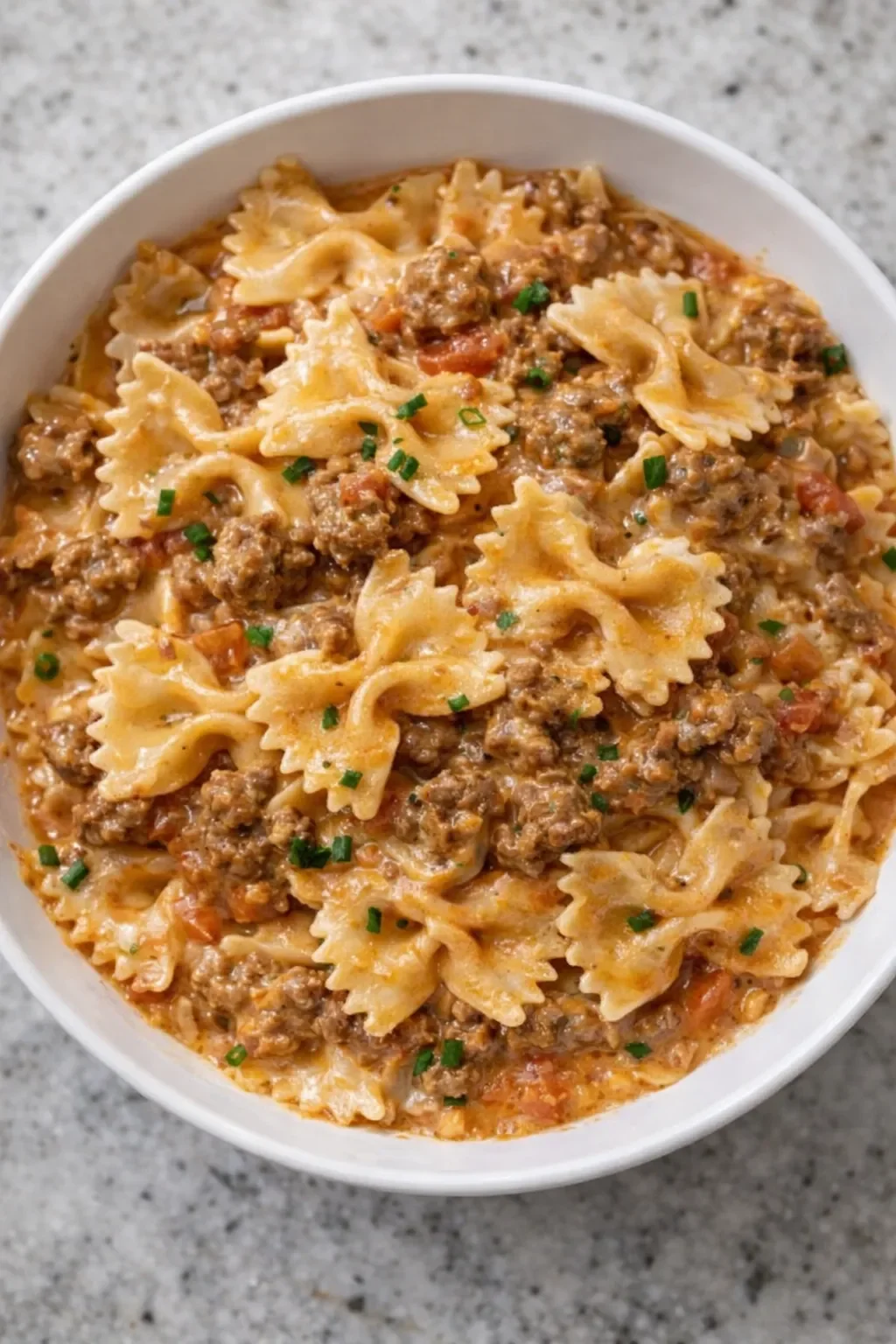 Cheesy Ground Beef Bowtie Pasta in Velveeta Cream Sauce